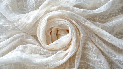  A close-up of a white fabric with a knotted design at its center, appearing both at the top and bottom