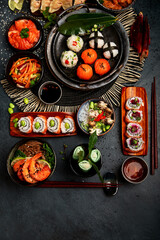 Traditional Japanese food dishes served on the table.