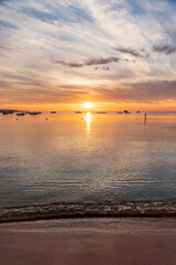 Fototapeta premium Beautiful red and orange sunrise over the sea.