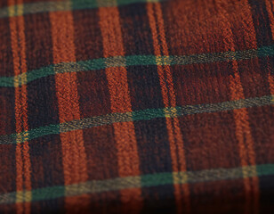 Macro shot of a fabric tartan pattern, highlighting its intricate weave and thread details