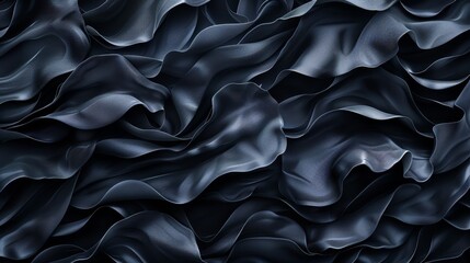 Fototapeta premium A tight shot of a black backdrop featuring a wavy texture of fabric at the bottom The fabric's undulating pattern is distinctly visible, covering the image's base, while