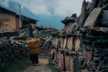 Mani wall in a village during Tsum Valley Trek, Nepal