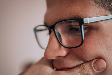 A programmer diligently testing smartphone applications while sitting in their office.