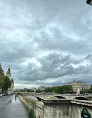 The Pont au Change bridge spans over the Seine River in the heart of Paris, France.