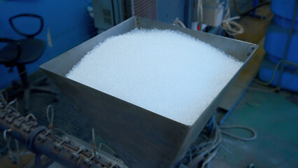 Polymer silica gel desiccant for electronic device protection. Creative. Close up of container...