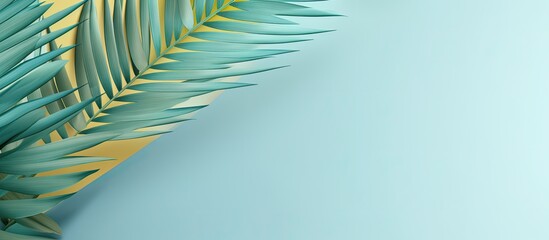 A copy space image featuring paper palm leaves that evoke the tropical summer concept