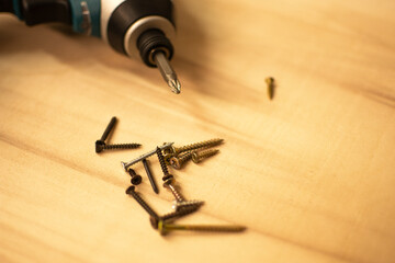 SCREWDRIVER AND WOODEN BOARD