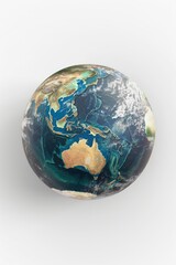 Fototapeta premium A globe of the earth with Australia and the Pacific Ocean. The globe is white and blue