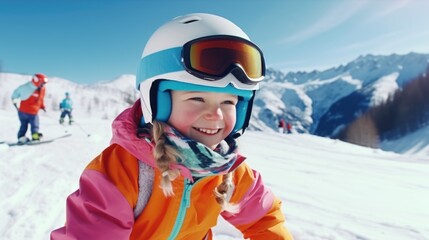 A young girl wearing a bright orange jacket and goggles is smiling as she rides a snowboard down a snowy slope