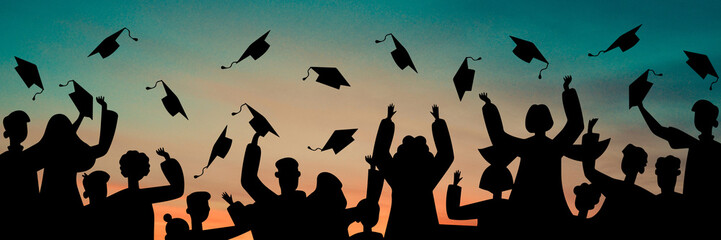 Silhouettes of students with graduate caps on panoramic sunset background