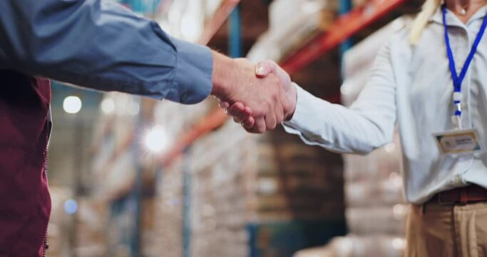 Handshake, teamwork and people in warehouse for agreement, freight and deal for supply chain. Logistics officer, factory and management shaking hands for shipping, cargo and service for ecommerce