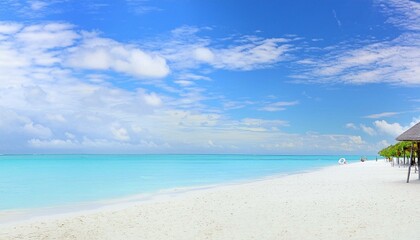 Obraz premium beautiful beach with white sand, clear blue water, and palm trees in the background. picturesque beach panorama, endless white sand, turquoise waves lapping the shore, beneath a vast blue sky