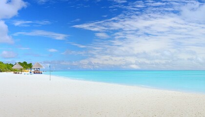 Fototapeta premium beautiful beach with white sand, clear blue water, and palm trees in the background. picturesque beach panorama, endless white sand, turquoise waves lapping the shore, beneath a vast blue sky