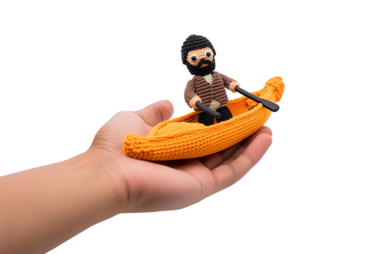 Sailing Dreams: A Hand Guiding a Tiny Sailor on a Boat Adventure on White or PNG Transparent Background.