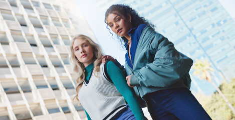 Serious, students and women in portrait for travel to college campus outdoor in urban city. Female...