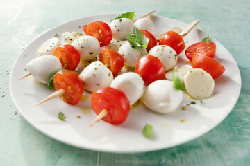 Caprese salad served on plate