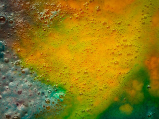 abstract background of multi-colored bubbling liquid