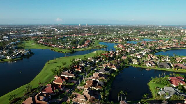 Drone aerial view flying over a golf course community in South West Florida