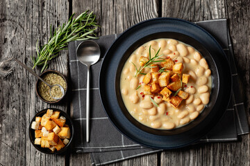 rosemary garlic creamy white bean soup in bowl