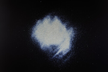 abstract white dust on a black background.
