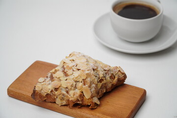Almond croissant isolated on a white background
