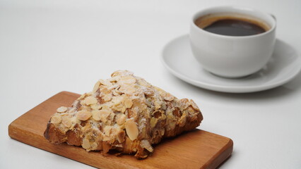 Almond croissant isolated on a white background

