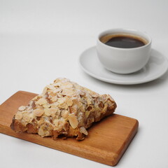 Almond croissant isolated on a white background
