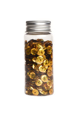 Golden sequins in the transparent jar bottle isolated on the white background. Front view.