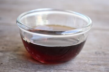 Fish sauce on wood background