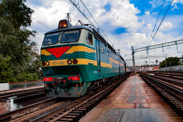 Obraz premium Electric Locomotive on Tracks