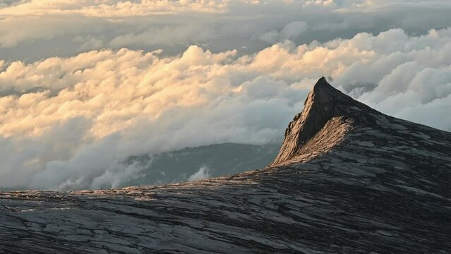 Footage of an iconic peak named South Peak on Mt.Kinabalu, Malaysia. Mount Kinabalu is the tallest mountain in Malaysia and Borneo.