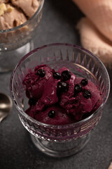 Ice cream blueberry cheesecake in glass creamers