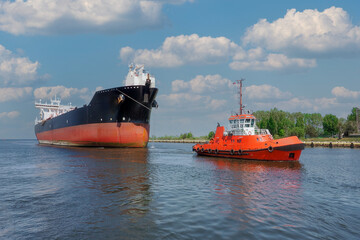 Port of Gdansk, Poland, a large tanker PEARY SPIRIT enters the port, accompanied by the port tug TAURUS
