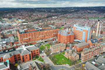 Aerial photo take in the town of Harehills in Leeds just outside the city centre, showing the St James's University Hospital known as Jimmy's with traffic and ambulances parked up at A and E entrance