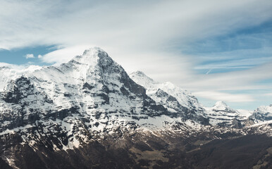view to the Eiger-Nordwand in front of cloudy sky. Grindelwald, Switzerland