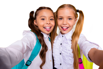 Close up portrait of cute, nice, lovely, sweet, adorable small girls take selfie on a smartphone isolated on yellow background look at the camera and show the tongue out