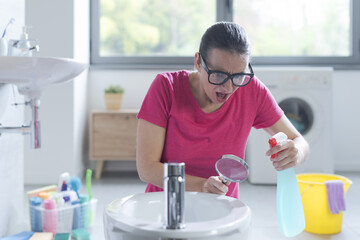 Woman obsessed with hygiene, she is doing chores