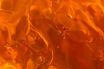 Orange Golden Gel Texture with Bubbles Macro