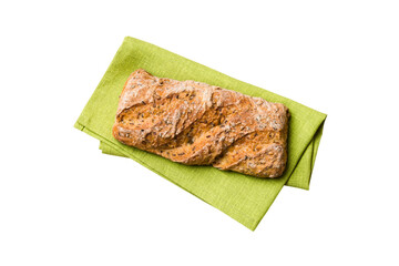 Freshly baked delicious french bread with napkin isolated on white background top view. Healthy white bread loaf