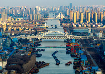 Aerial photography of busy transportation operations along the Beijing-Hangzhou Grand Canal in Huai...