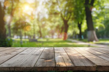 Empty wooden table, with blurred park and garden background. Space for product or brand advertising
