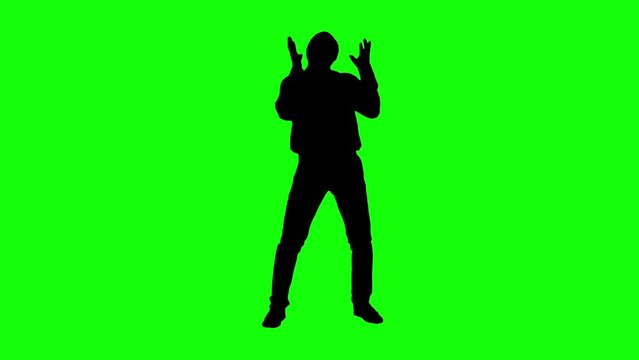 Black silhouette man dancing on green background. Green screen for compositing and presentation.