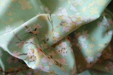 Rumpled light mint green thin rayon fabric