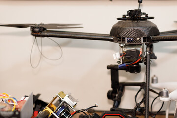 Workshop and repair production custom UAV quadcopter drone with parts stuff.