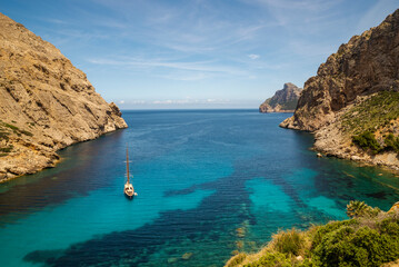 Cala Boquer little beach is an idyllic turquoise water paradise for sailboats and tourists, located at the end of Boquer valley, Port de Pollensa, Majorca, Balearic Islands, Spain