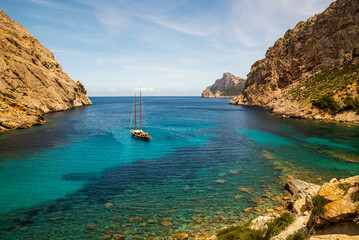 Cala Boquer little beach is an idyllic turquoise water paradise for sailboats and tourists, located...