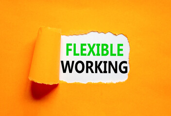Flexible working symbol. Concept words Flexible working on beautiful white paper. Beautiful orange paper background. Business flexible working concept. Copy space.