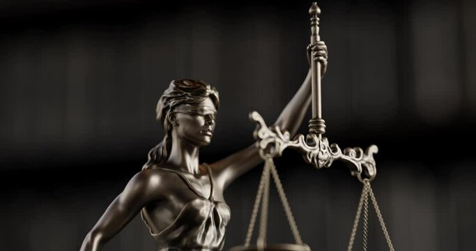 Legal Concept: Themis is the goddess of justice and the judge's gavel hammer as a symbol of law and order on the background of books