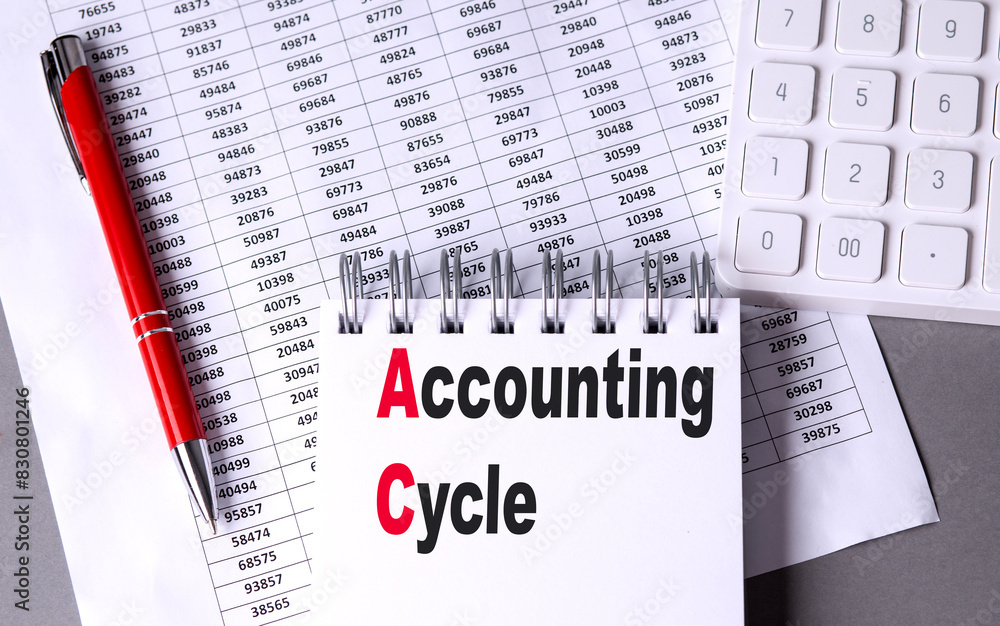 Poster accounting cycle text on notebook with chart , pen and calculator