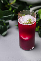 Refreshing beetroot smoothie with herbal garnish